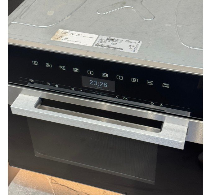 Комбінована парова шафа з функцією НВЧ DGM 7440 чорна з хромом